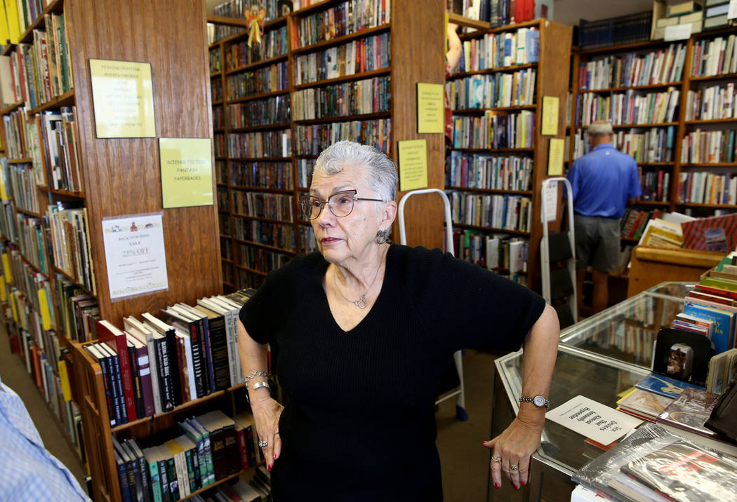 Myrna Donato, owner of Amber Unicorn Books at 2101 S. Decatur Blvd. in Las Vegas, talks to a re ...
