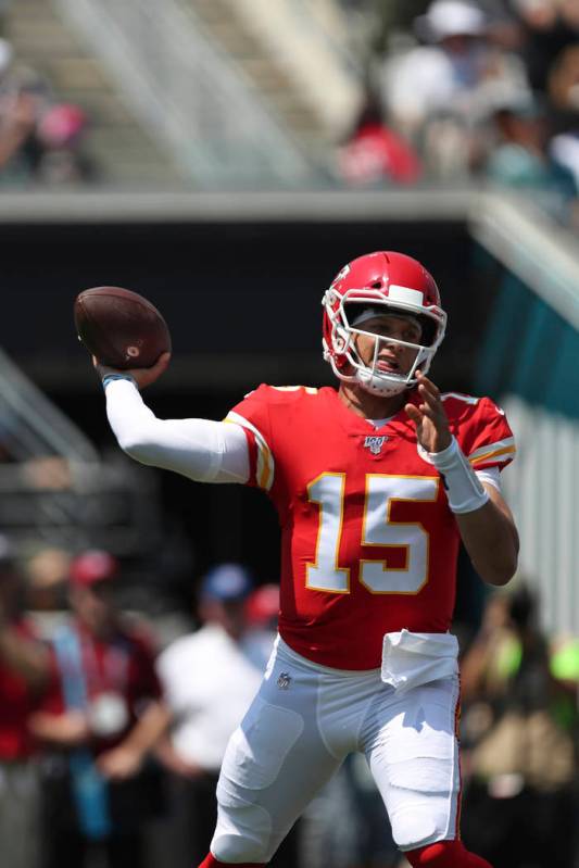 Kansas City Chiefs quarterback Patrick Mahomes (15) throws a pass during an NFL football game a ...