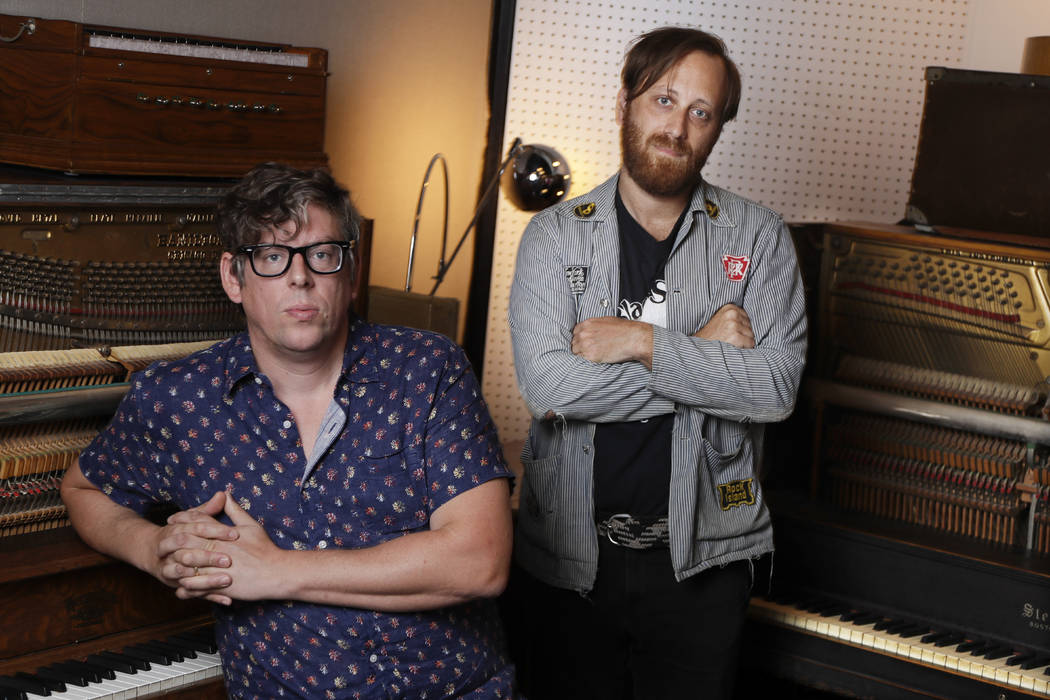 In this Aug. 19, 2019, photo, Patrick Carney, left, and Dan Auerbach of The Black Keys pose for ...
