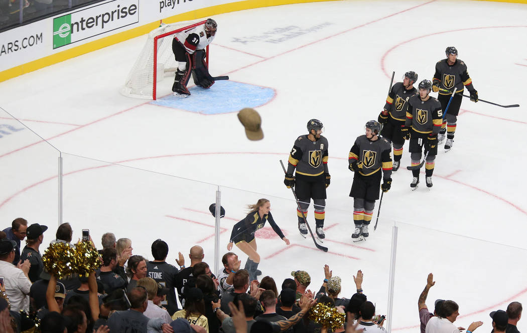 Hats fly onto the ice after Vegas Golden Knights left wing Max Pacioretty (67) scored his third ...