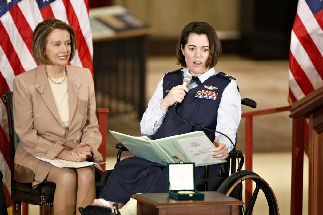 In this March 10, 2010 file photo, Air Force Lt. Col. Nicole Malachowski, right, is joined by H ...