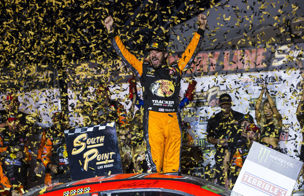 Martin Truex Jr. celebrates after winning a NASCAR Cup Series auto race at the Las Vegas Motor ...