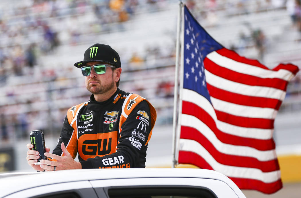 Kurt Busch looks on before a NASCAR Cup Series auto race at Las Vegas Motor Speedway, Sunday, S ...