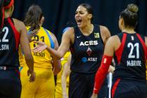 Las Vegas Aces center Liz Cambage (8) gets pumped after scoring against the Chicago Sky during ...