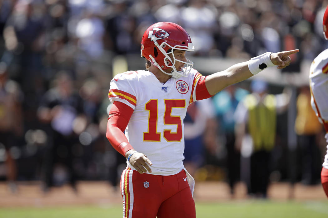 Kansas City Chiefs quarterback Patrick Mahomes calls a play during the first half of an NFL foo ...