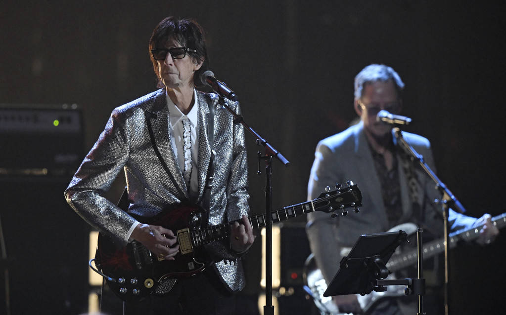 Ric Ocasek, left, from the Cars, performs during the Rock and Roll Hall of Fame induction cerem ...