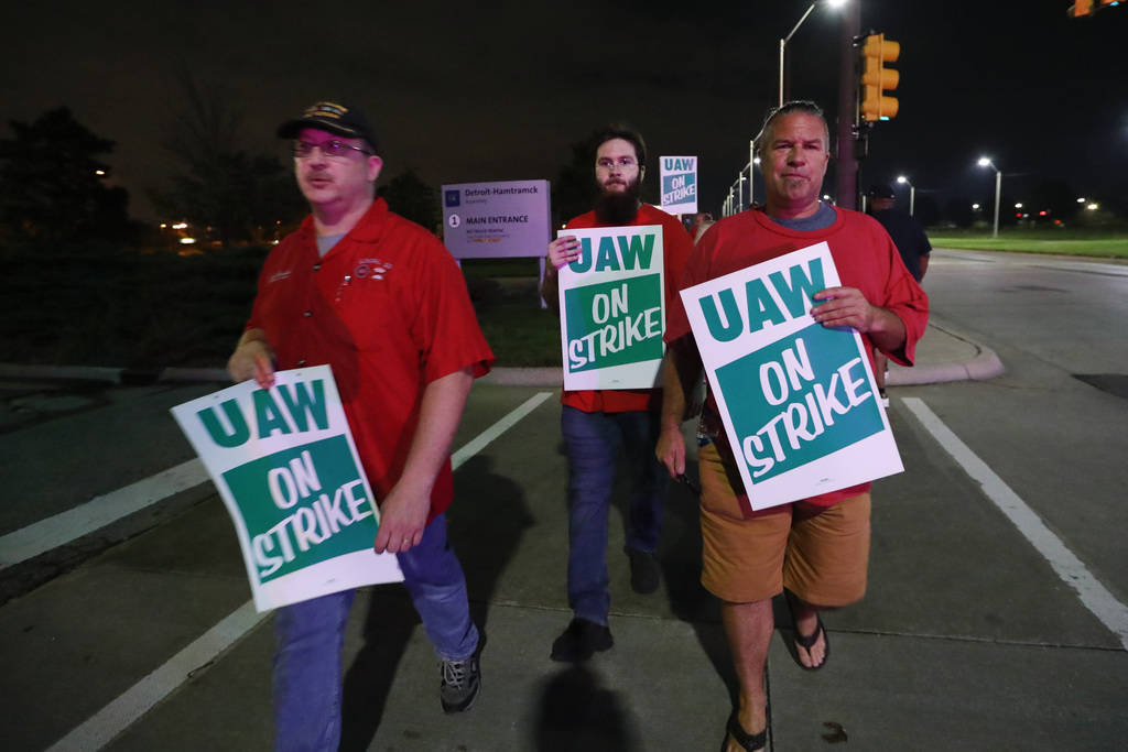 United Auto Workers members picket outside the General Motors Detroit-Hamtramck assembly plant ...