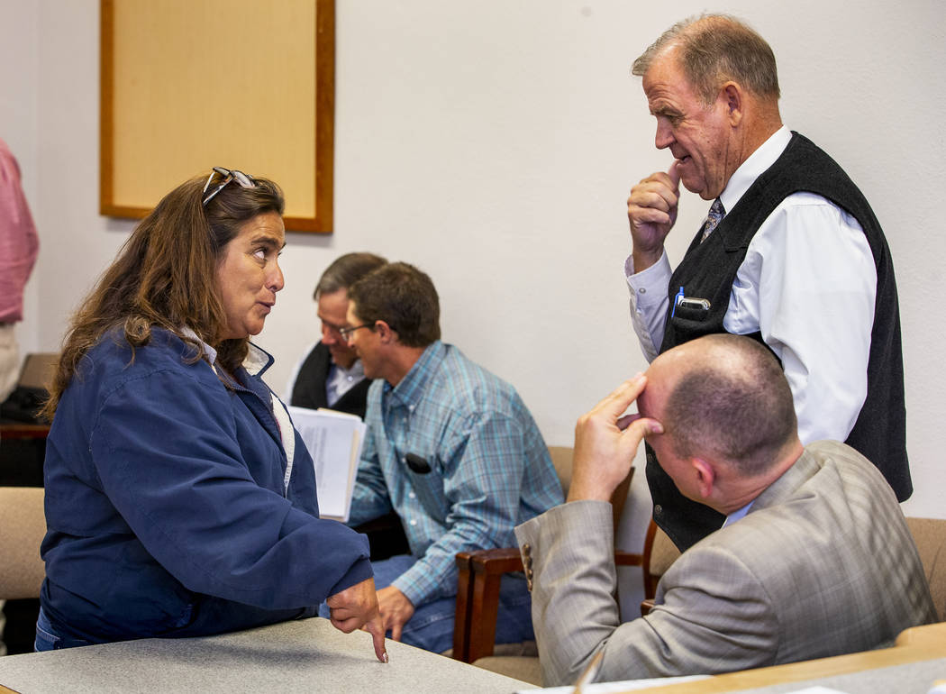 Connie West, left, of the Little A'Le'Inn in Rachel confers with District Attorney Dylan Frehne ...