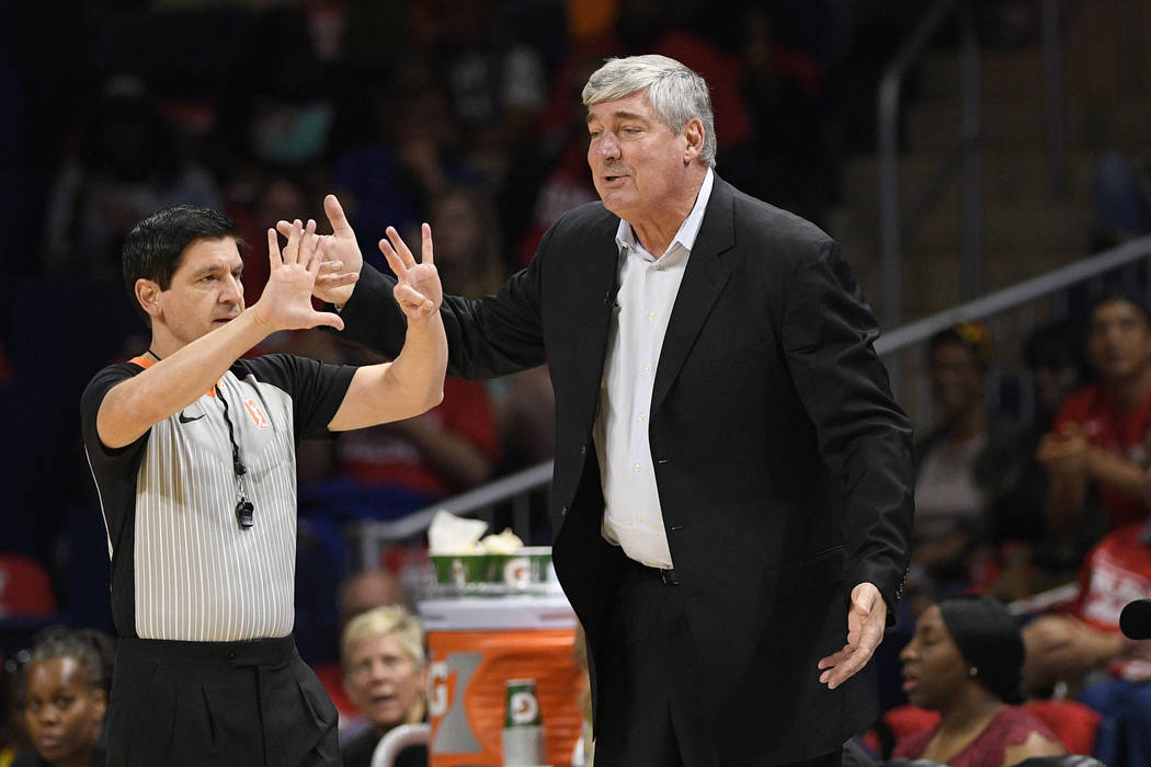 Las Vegas Aces coach Bill Laimbeer, right, gestures to an official during the second half of Ga ...