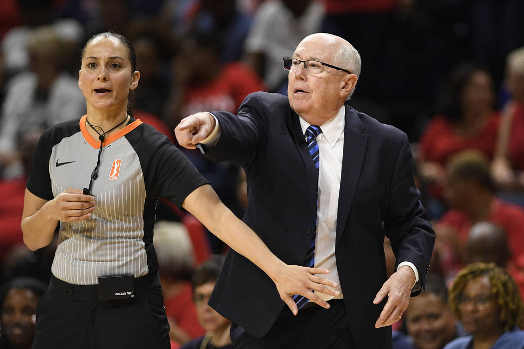 Washington Mystics coach Mike Thibault, right, points next to an official during the second hal ...