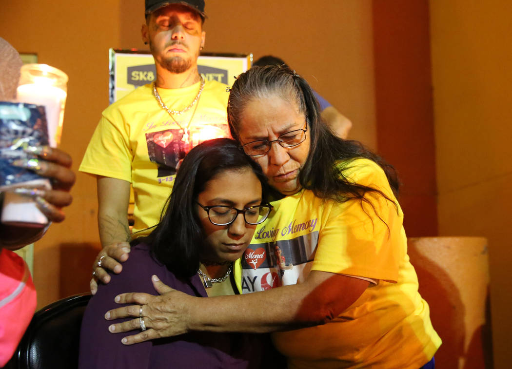 Maria Conchos, left, mother of Monet Garcia, comforted by her mother Josefina Conchos, during a ...