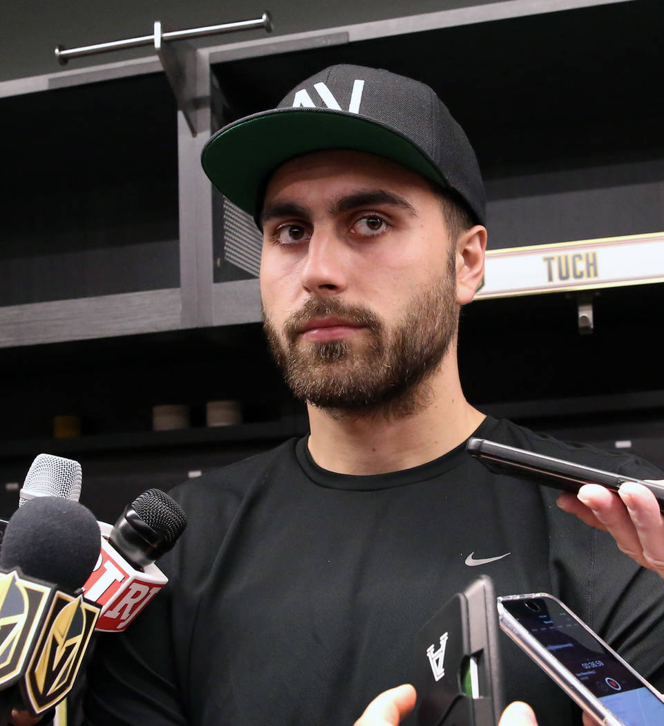 Golden Knights right wing Alex Tuch listens to reporters questions as he addresses the media at ...