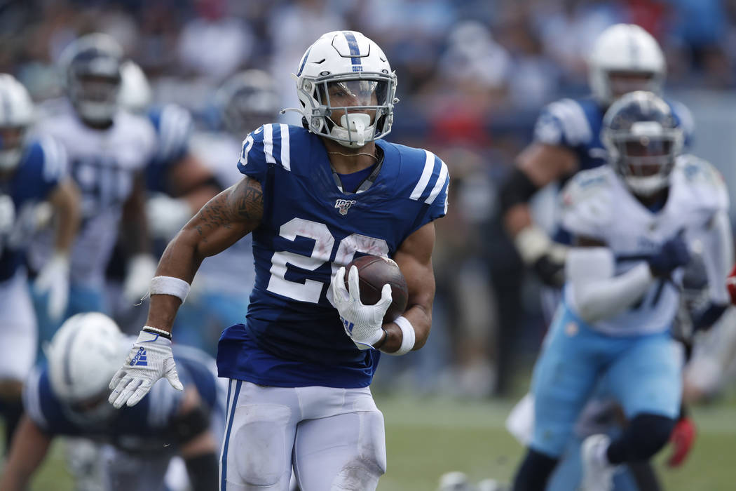Indianapolis Colts running back Jordan Wilkins (20) runs the ball against the Tennessee Titans ...