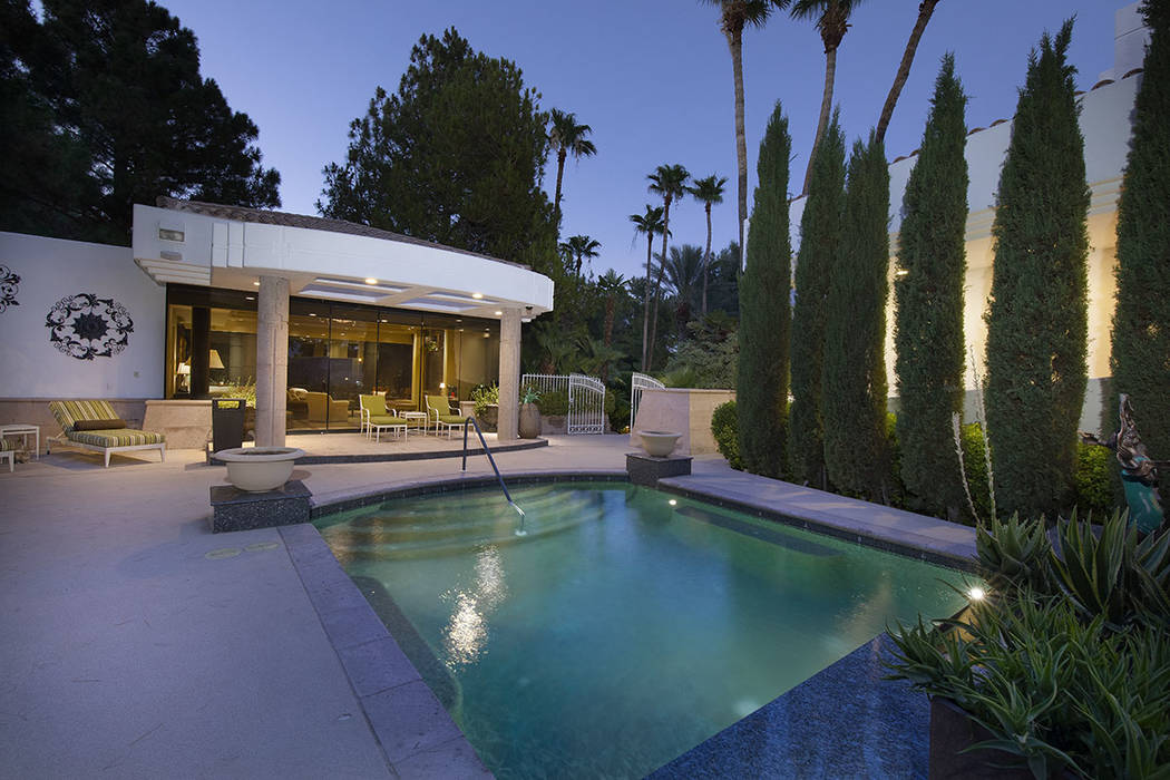 The guest house is near a small pool. (Synergy Sotheby’s International Realty)