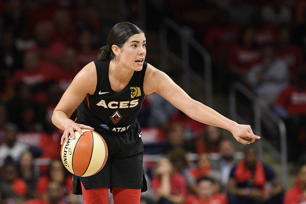 Las Vegas Aces guard Kelsey Plum dribbles the ball against the Washington Mystics during the se ...