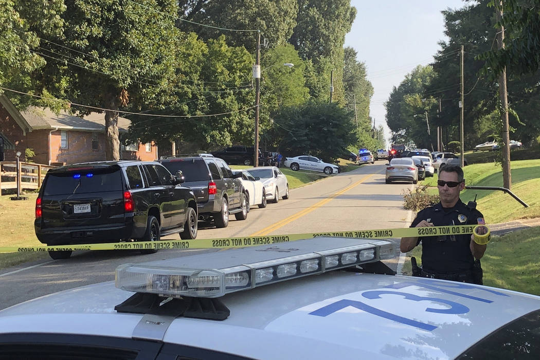 Police cordon off the scene of a shooting in Memphis, Tenn., on Wednesday, Sept. 18, 2019. Offi ...