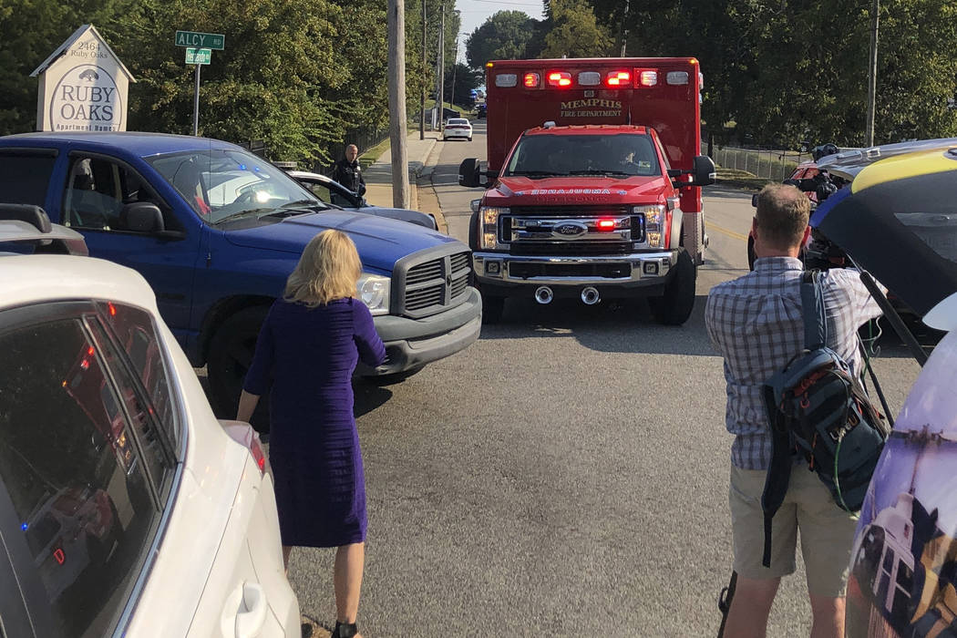 An ambulance leaves the scene shooting in Memphis, Tenn., on Wednesday, Sept. 18, 2019. Officia ...