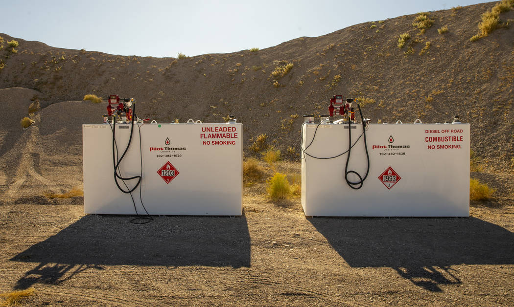 Gas tanks are staged for emergency vehicles at the Incident Command Post in the Tikaboo Valley ...