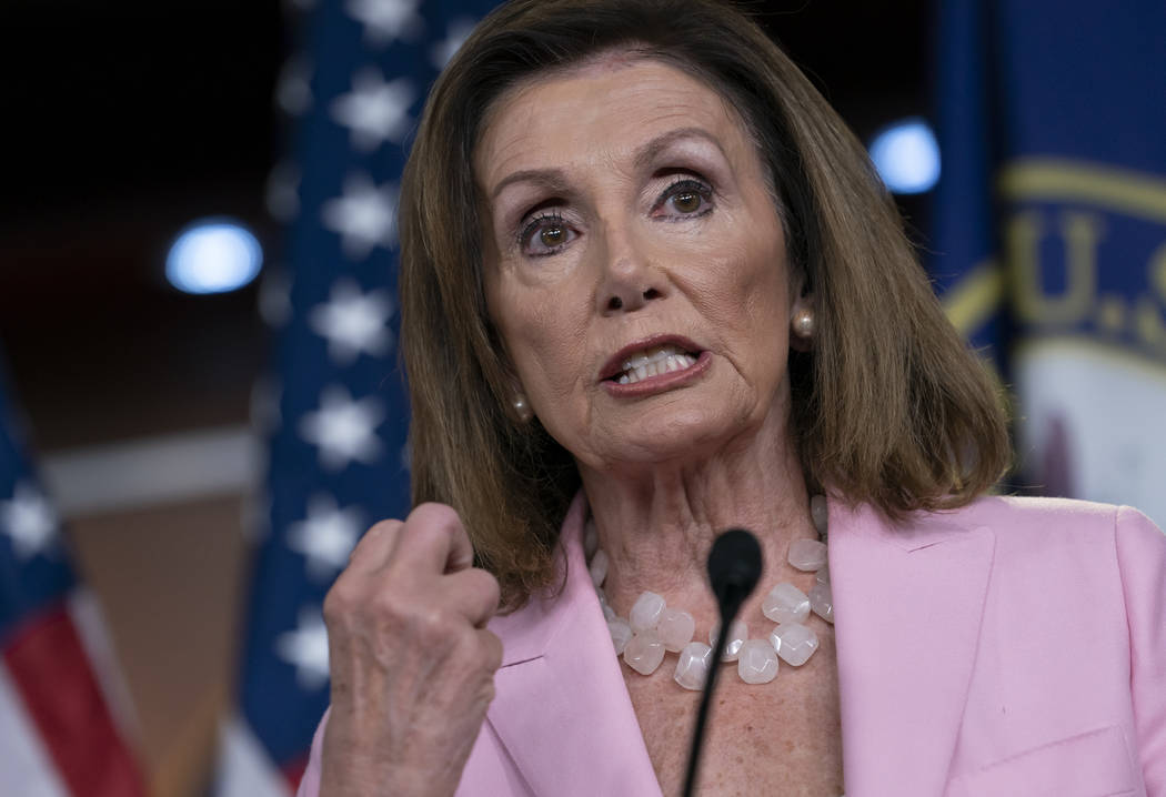 Speaker of the House Nancy Pelosi, D-Calif., meets with reporters at the Capitol in Washington, ...