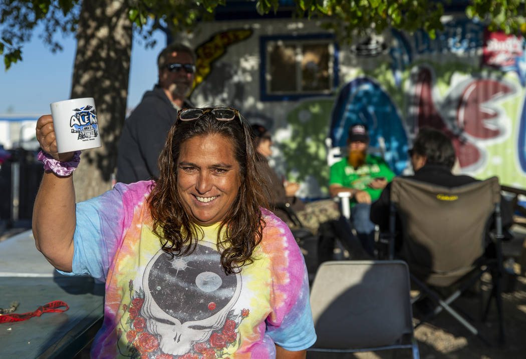 Connie West of the Little A'Le'Inn greets the day as the restaurant behind will serve coffee an ...