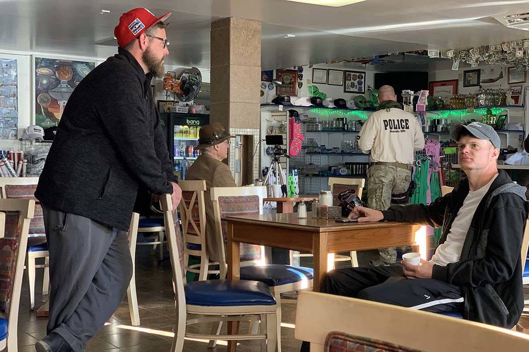 Dustin Goodwin, left, of Houston, met up with his friend Jared Sheldon of Oklahoma City, sittin ...