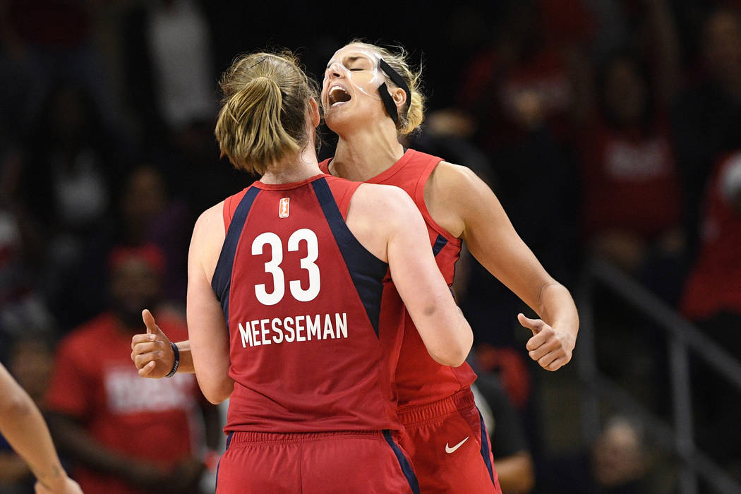 Washington Mystics center Emma Meesseman (33) and Elena Delle Donne, back reacts during the sec ...