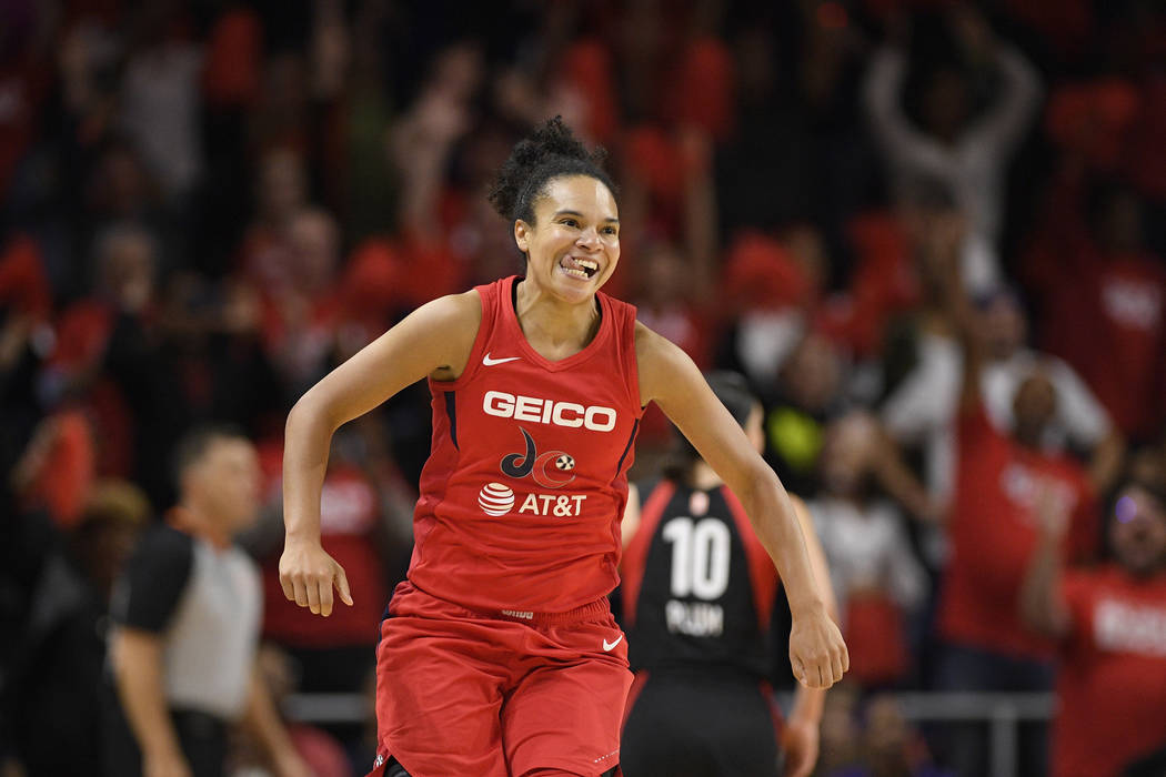 Washington Mystics guard Kristi Toliver reacts after making a basket during the second half of ...