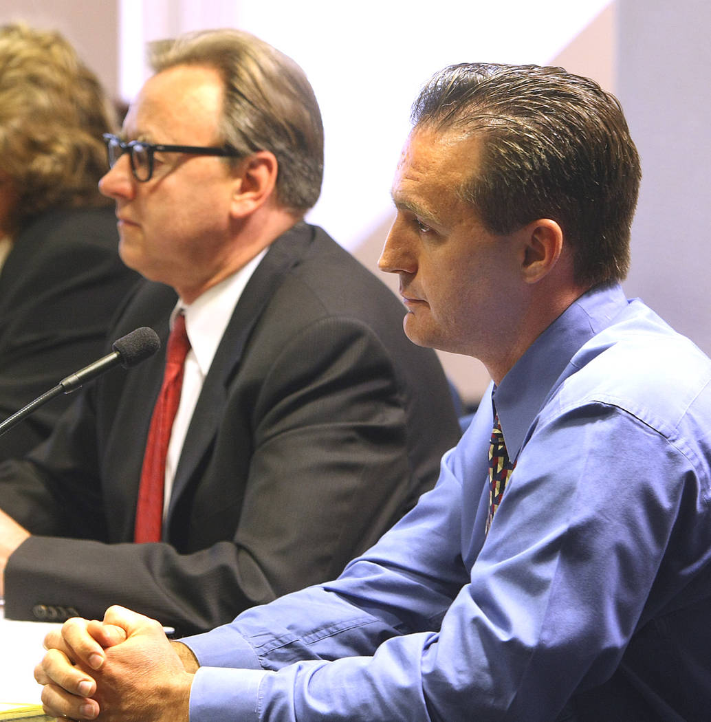 Chiropractor Stephen Shaw, right, appears before the Nevada Chiropractic Physicians Board with ...