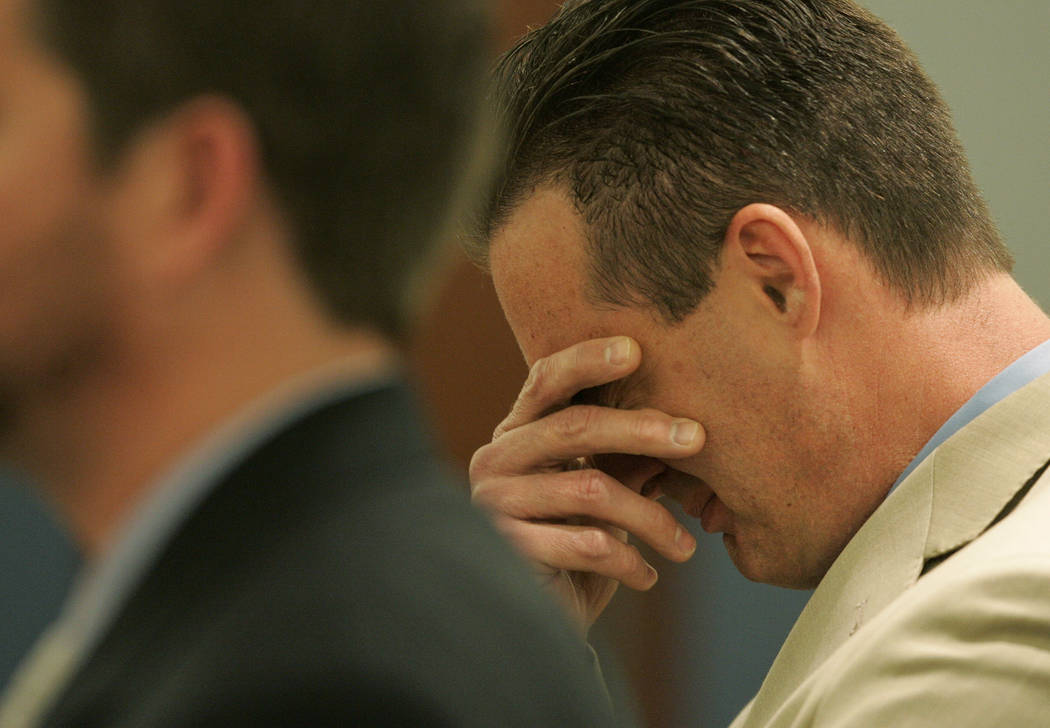 Chiropractor Stephen Shaw, right, weeps at the Regional Justice Center in Las Vegas on May 25, ...