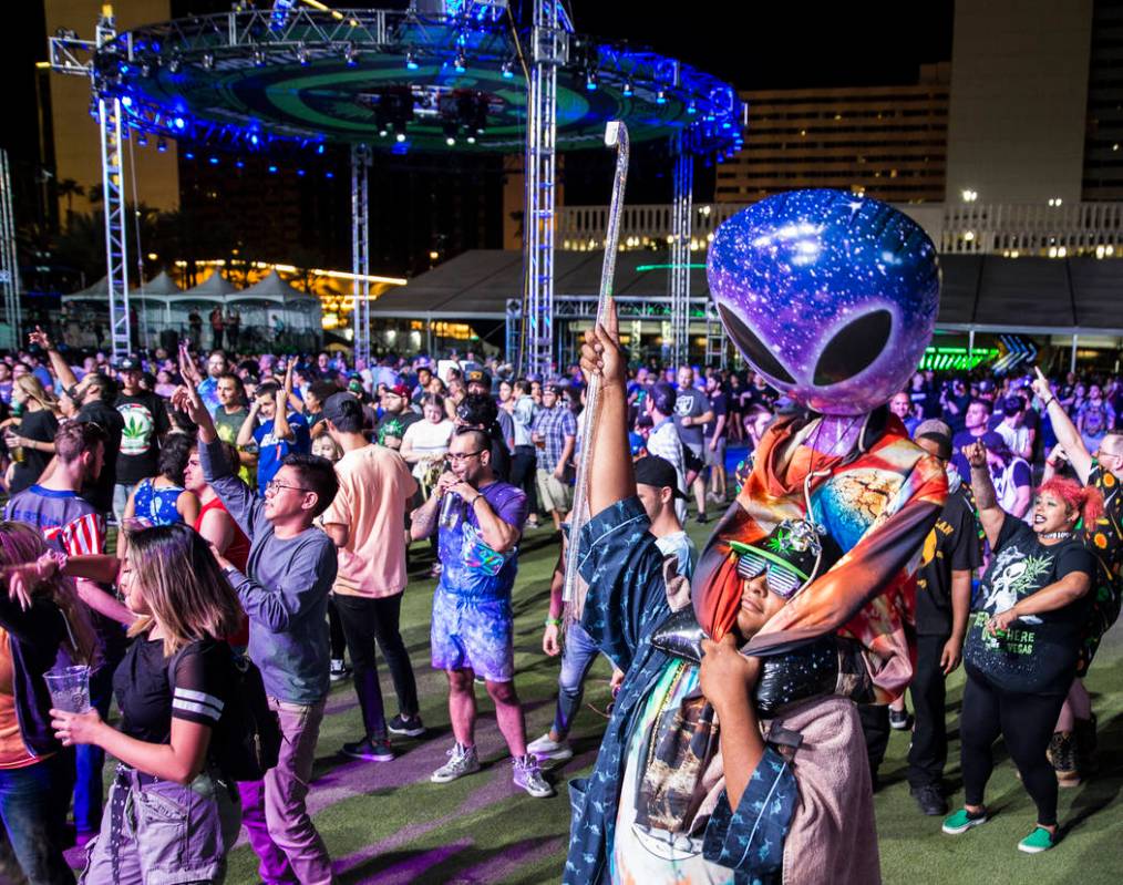 Attendees dance to TYPE3 during the Area 51 Celebration on Thursday, Sept. 19, 2019, at Downtow ...