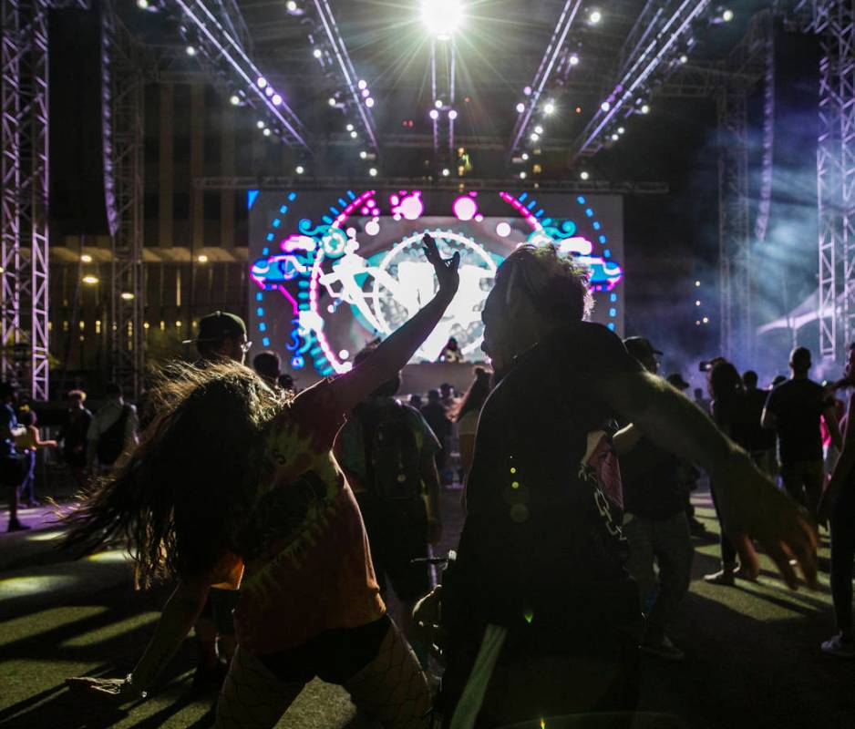 Attendees dance to TYPE3 during the Area 51 Celebration on Thursday, Sept. 19, 2019, at Downtow ...