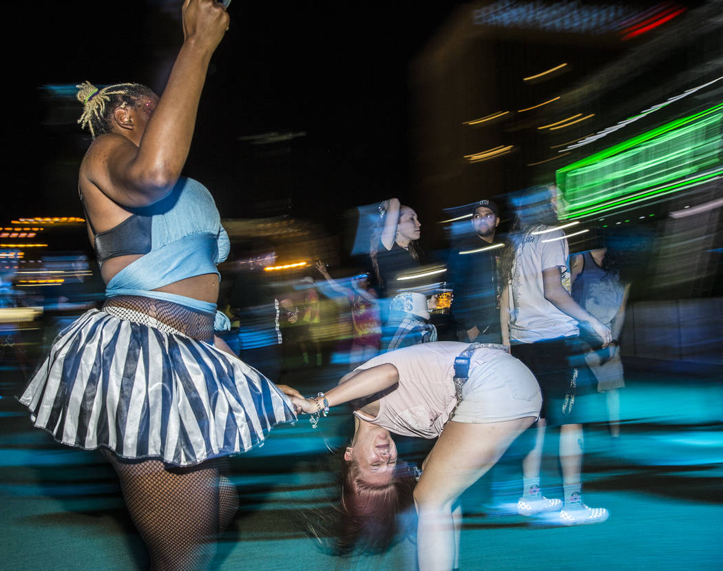 Attendees dance to TYPE3 during the Area 51 Celebration on Thursday, Sept. 19, 2019, at Downtow ...