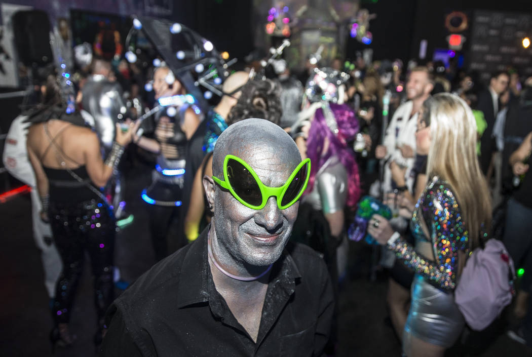 Seth Stylz dresses as a silver and green alien during a pre-party for Storm Area 51 on Thursday ...