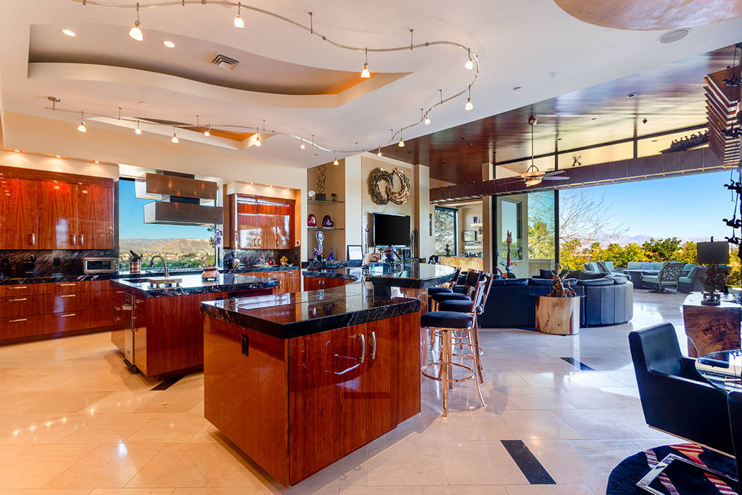 Ivan Sher Group Ruth Sender designed her kitchen with high-gloss African bubinga wood used for ...