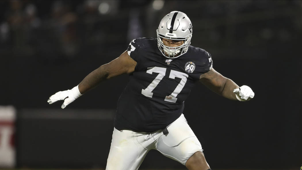 Oakland Raiders offensive tackle Trent Brown (77) protects a gap in the offensive line during a ...