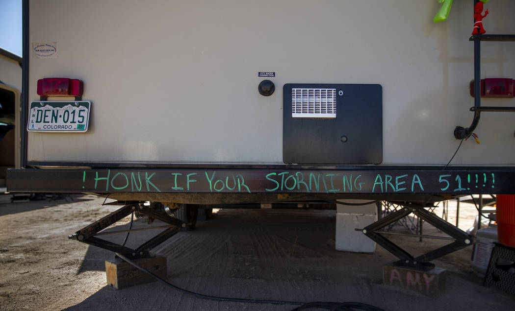 Sign on the bumper of an RV during the Alienstock festival on Friday, Sept. 20, 2019 in Rachel, ...