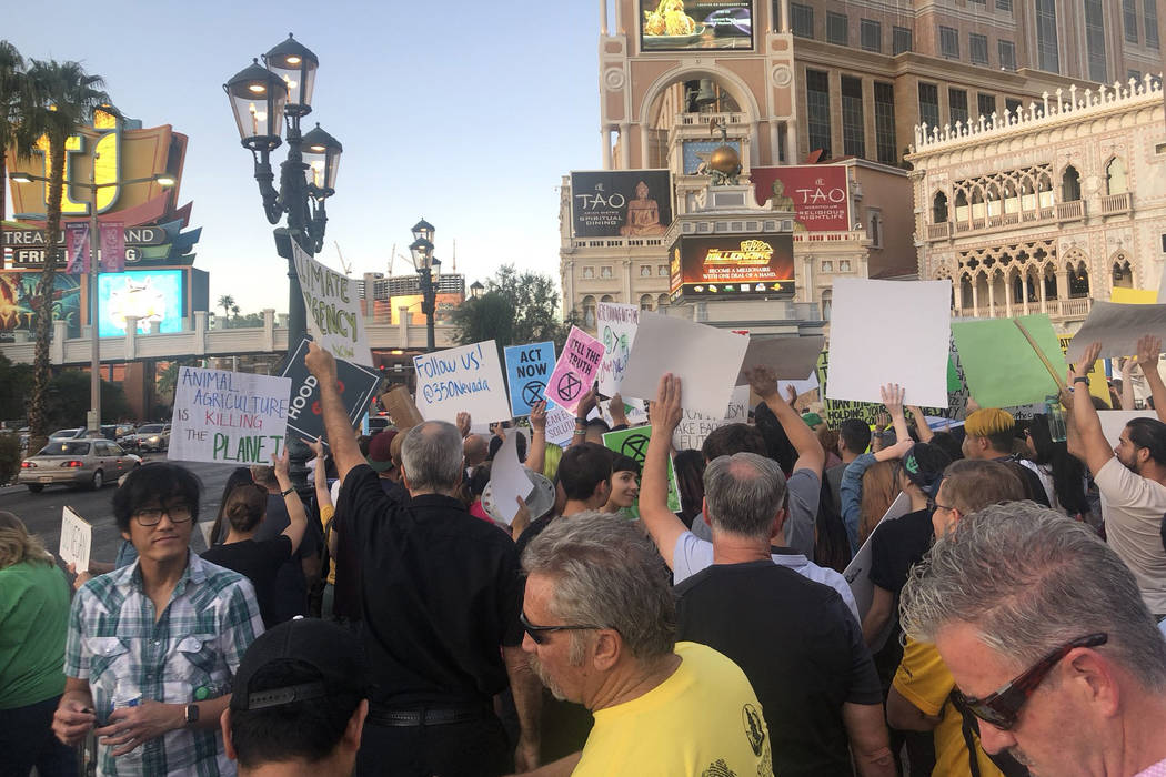 More than 100 people protest Friday, Sept. 20, 2019, outside The Venetian in Las Vegas as part ...