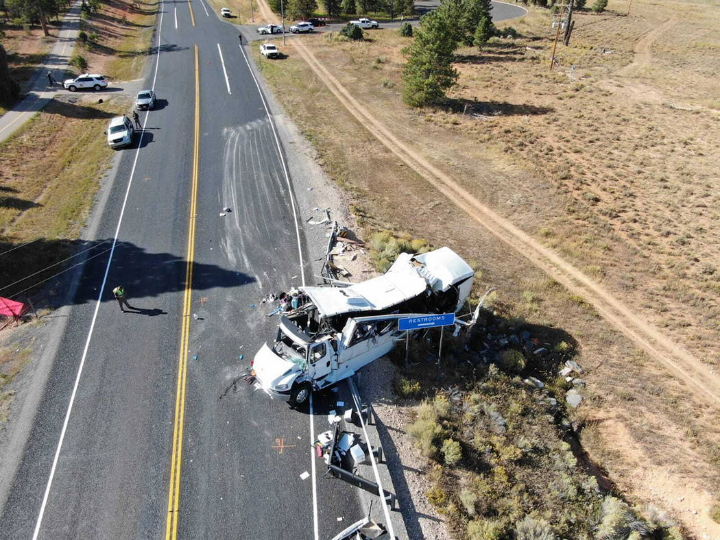 This photo provided by the Utah Highway Patrol shows a tour bus carrying Chinese-speaking touri ...