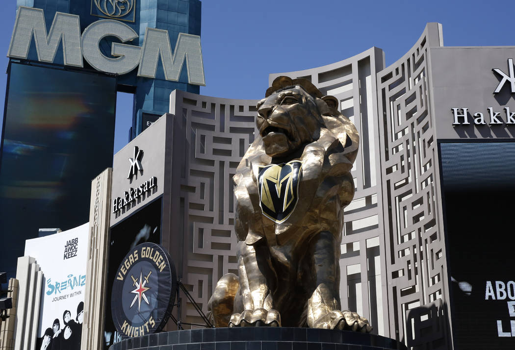 A giant puck promoting the Vegas Golden Knights is displayed outside the MGM Grand in Las Vegas ...