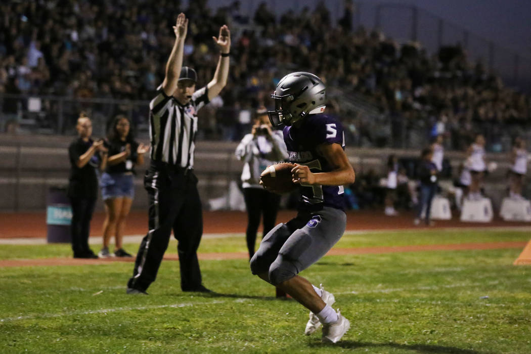 Silverado High's Jeremy Alipio (25) celebrates his touchdown against Durango High during the fi ...