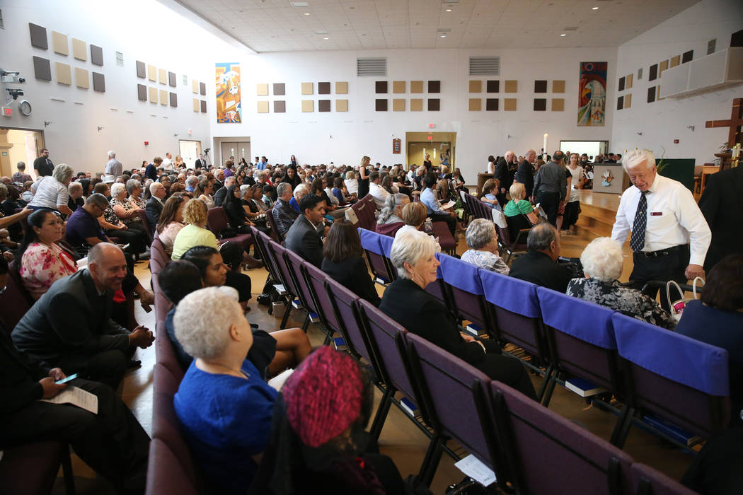 People attend the funeral mass for Paula Davis, an UNLV economics student, at St. John Neumann ...