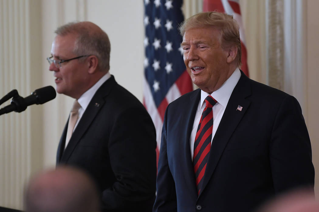 President Donald Trump and Australian Prime Minister Scott Morrison arrive for a news conferenc ...