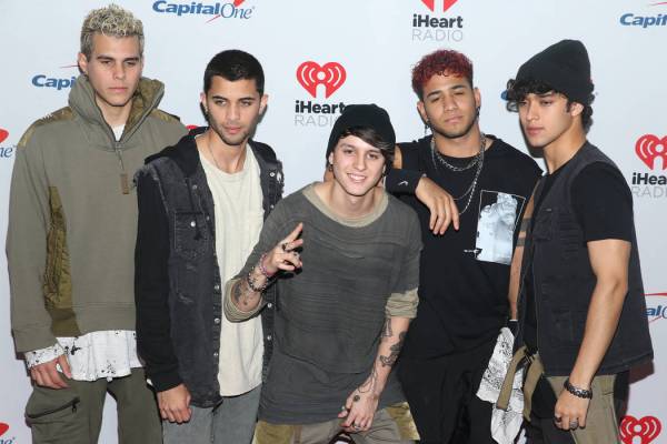 CNCO poses on the iHeartRadio red carpet at T-Mobile Arena in Las Vegas, Saturday, Sept. 21, 20 ...