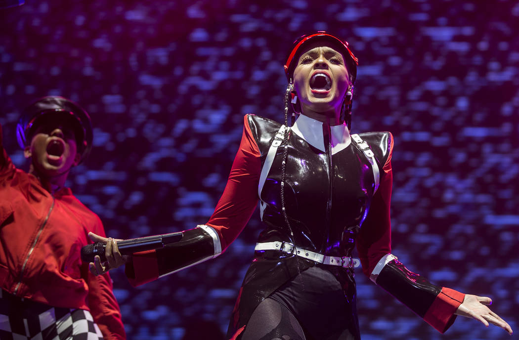 Janelle Monáe, right, performs on the Bacardi Stage during the second day of Life is Beaut ...