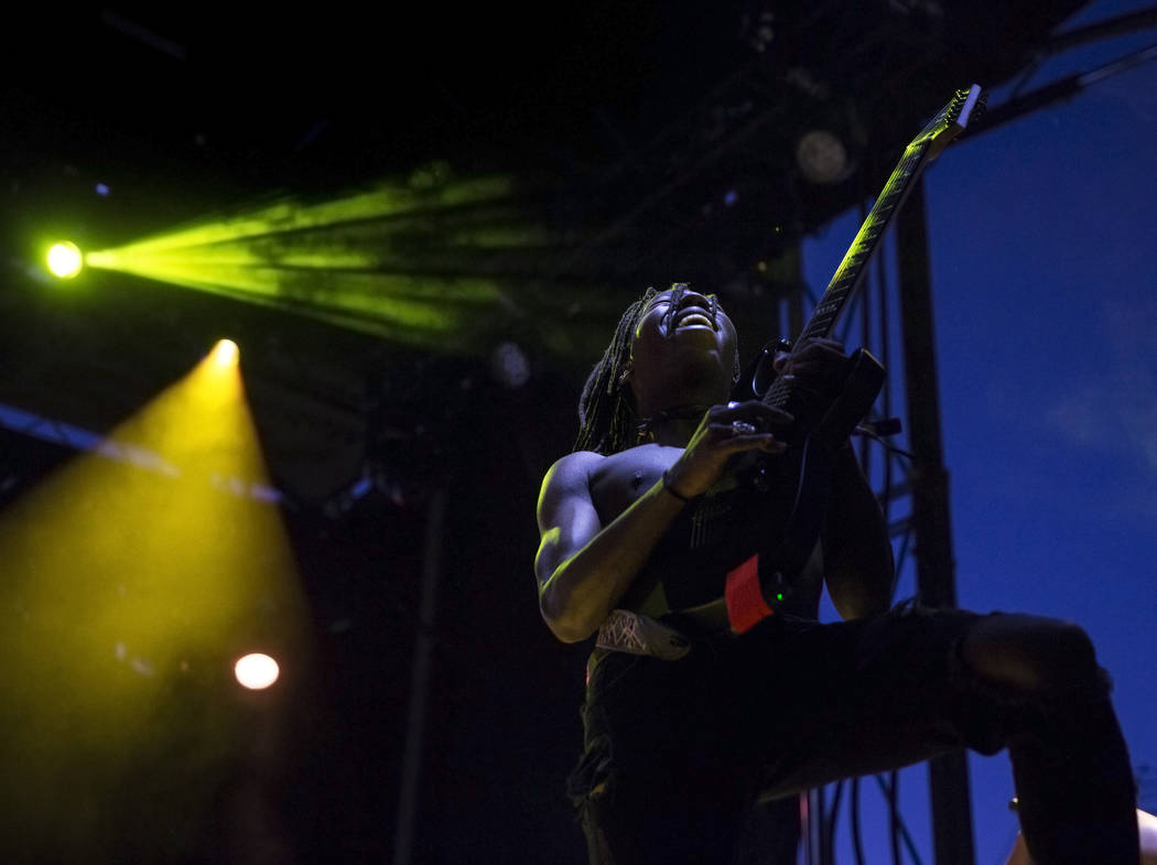 Taylor Bennett's guitarist performs on the Huntridge Stage during the second day of Life is Bea ...