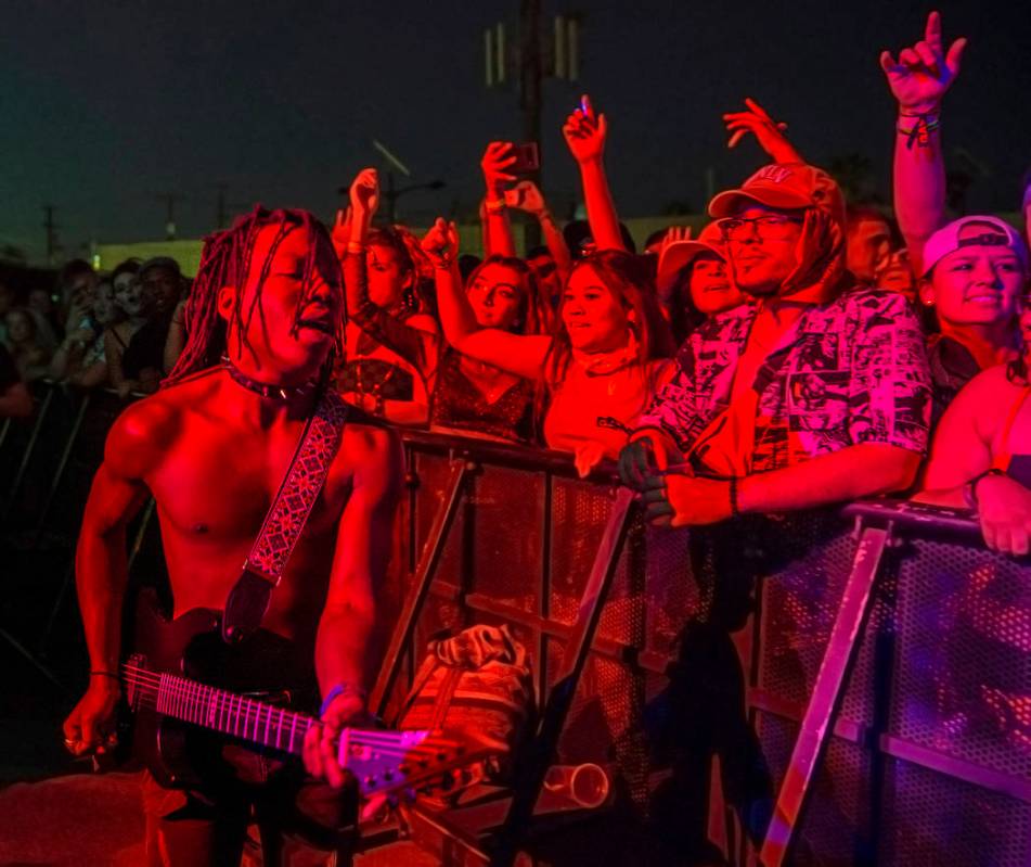 Taylor Bennett's guitarist performs on the Huntridge Stage during the second day of Life is Bea ...