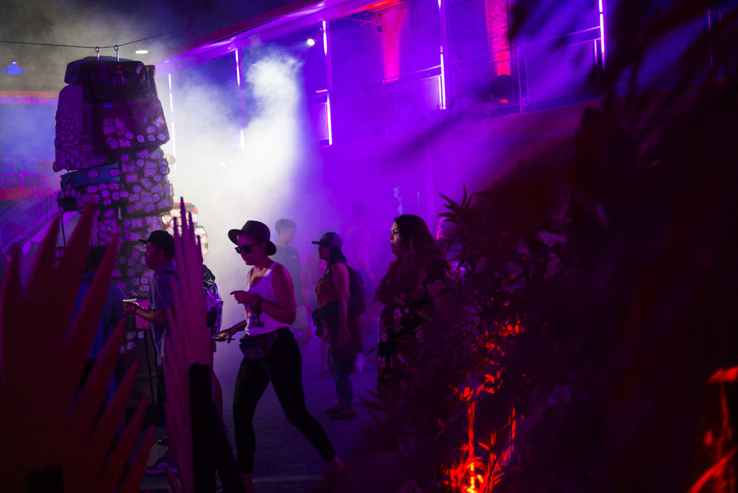 Attendees explore the Bacardi Art Motel during day 2 of the Life is Beautiful festival in downt ...