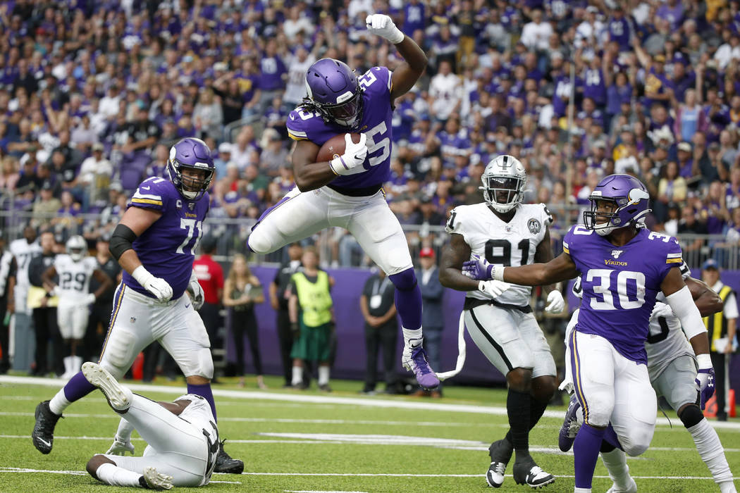 Minnesota Vikings running back Alexander Mattison (25) scores on a 10-yard touchdown run during ...