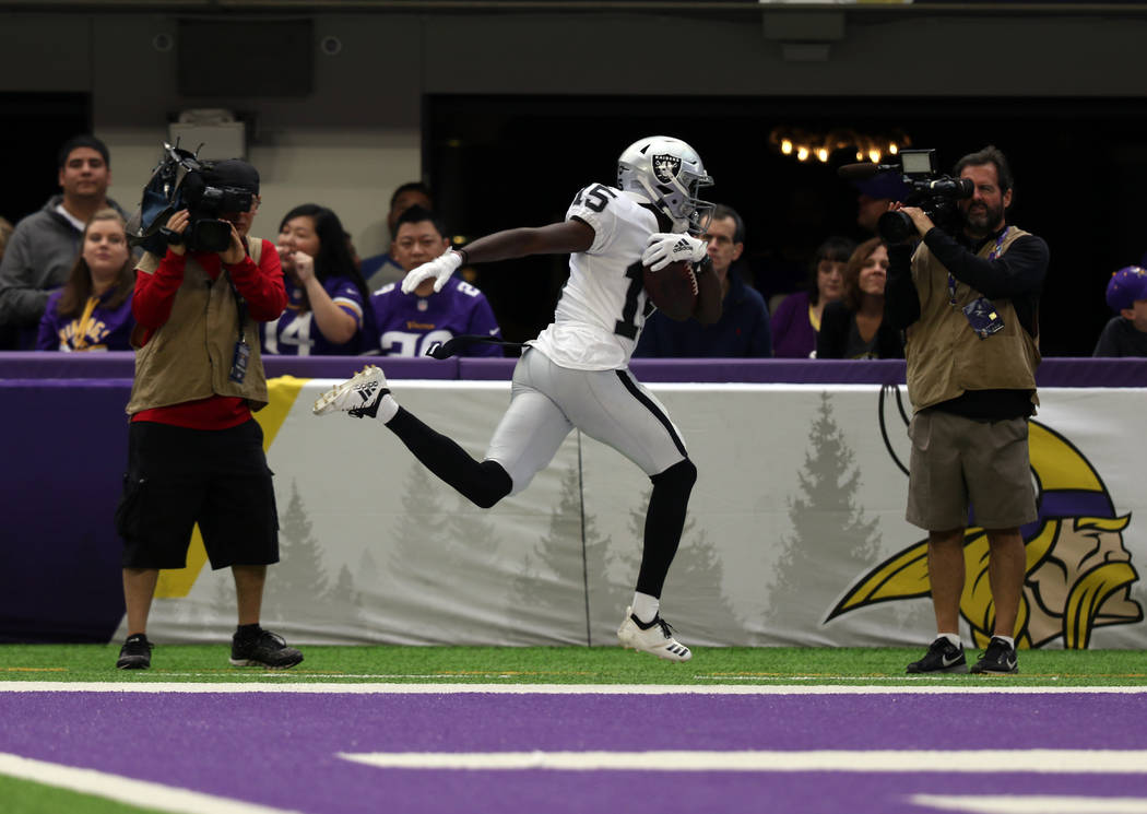 Oakland Raiders wide receiver J.J. Nelson (15) scores a touchdown during the first half of an N ...