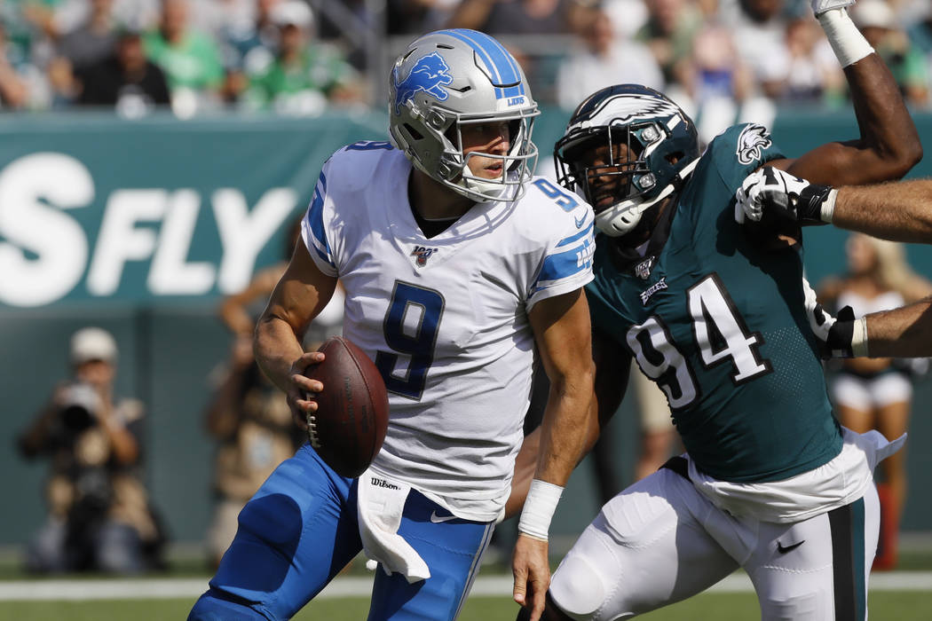 Detroit Lions' Matthew Stafford in action during the second half of an NFL football game agains ...